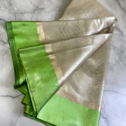 Nayanthara Beige Saree with Green Border Tissue Silk Saree