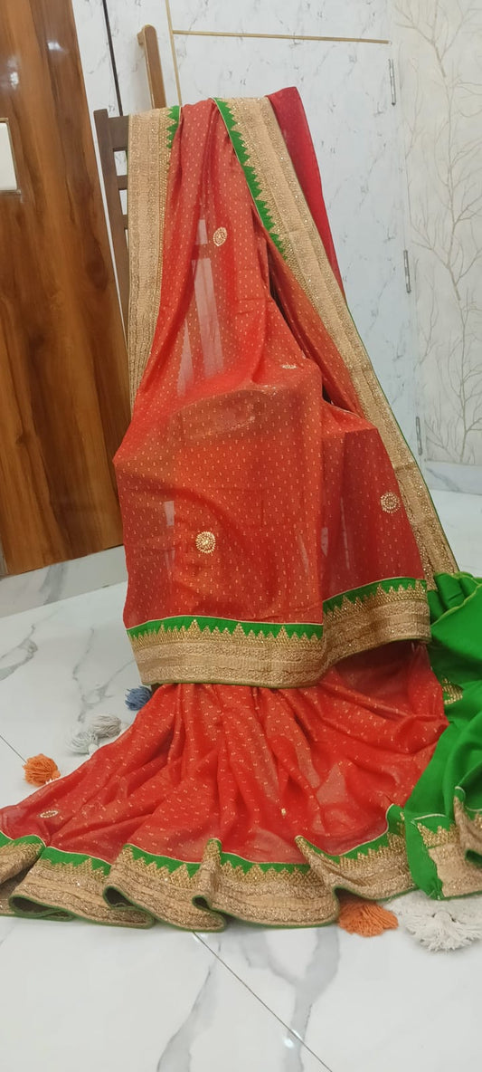 Rust Orange Shimmer Saree with heavy Zari work Contrast Green Blouse