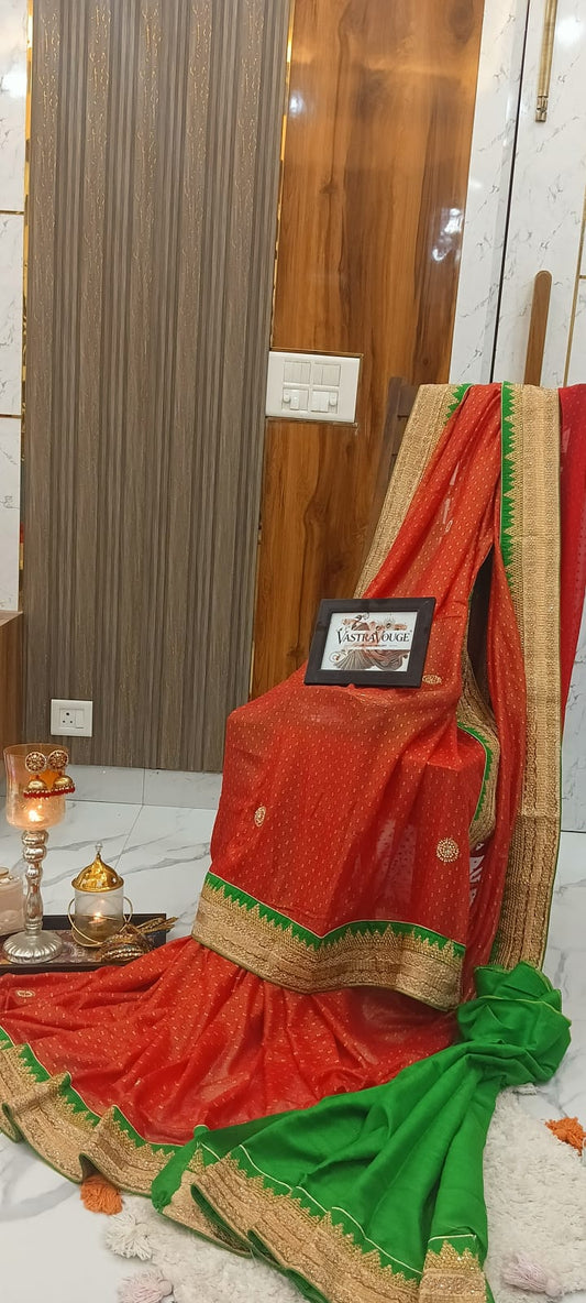 Rust Orange Shimmer Saree with heavy Zari work Contrast Green Blouse